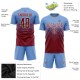Benutzerdefiniertes hellblaues purpurrotes und cremefarbenes Sublimations-Fußballtrikot Benutzerdefiniertes hellblaues purpurrotes und cremefarbenes Sublimations-Fußballtrikot